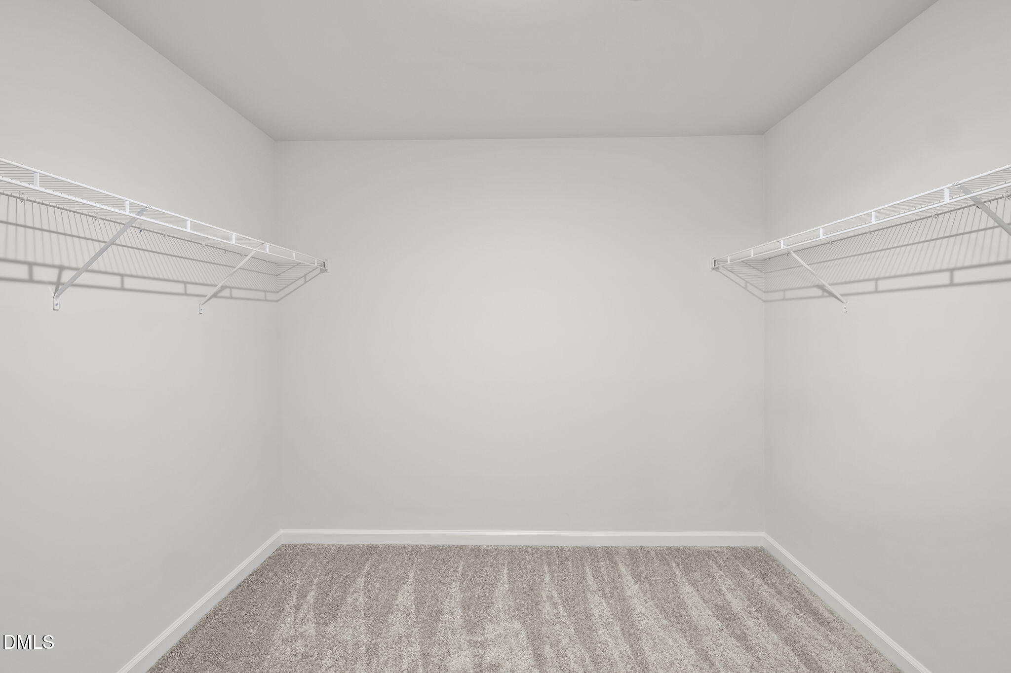 701 Mayfly Way Durham, NC 27703 - Photo 39 of 50 a view of an empty walk in closet
