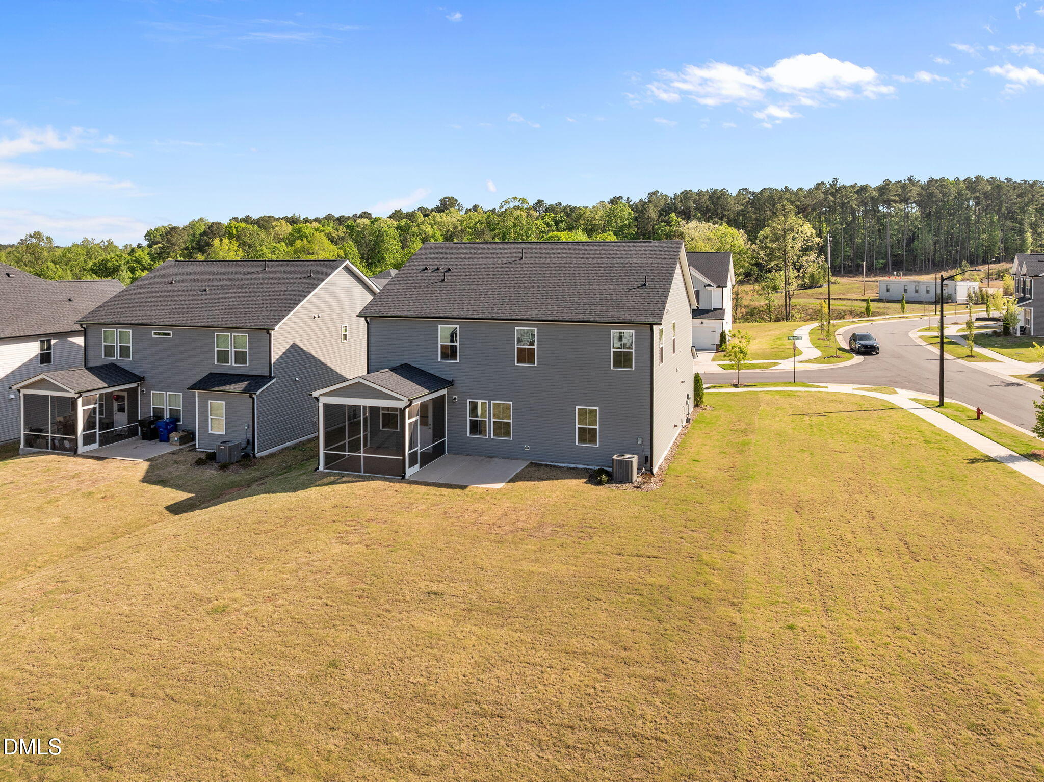 701 Mayfly Way Durham, NC 27703 - Photo 45 of 50 a view of a house with a swimming pool with a yard
