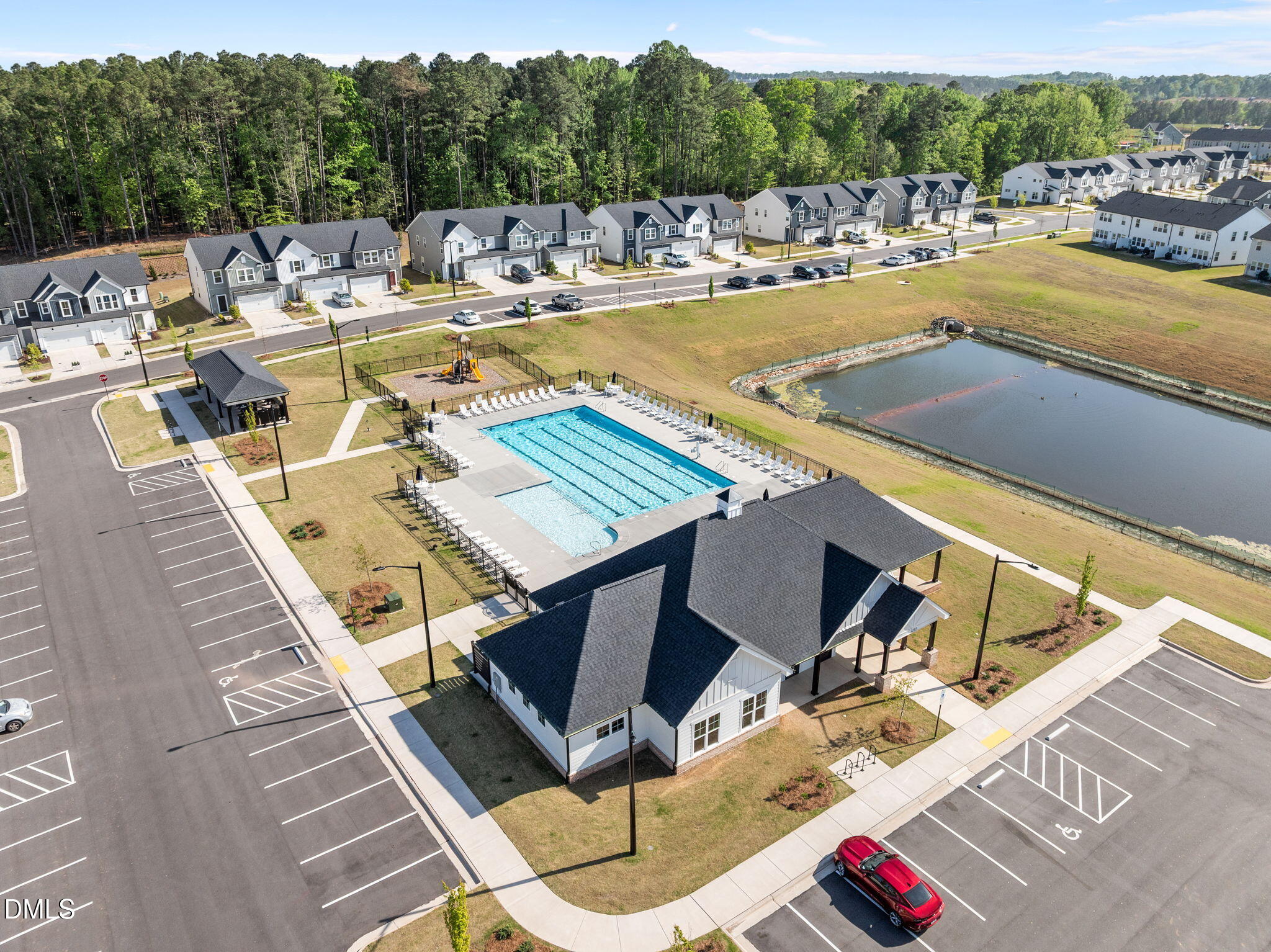 701 Mayfly Way Durham, NC 27703 - Photo 49 of 50 a view of a swimming pool with lounge chairs