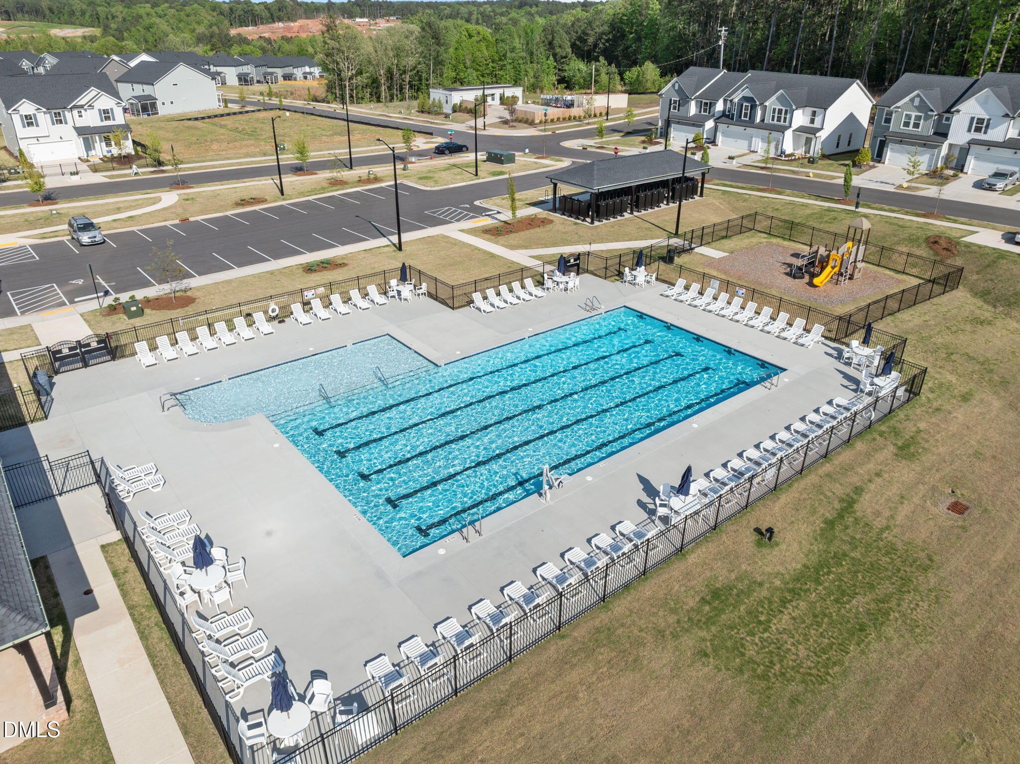 701 Mayfly Way Durham, NC 27703 - Photo 50 of 50 a view of a swimming pool with an outdoor seating