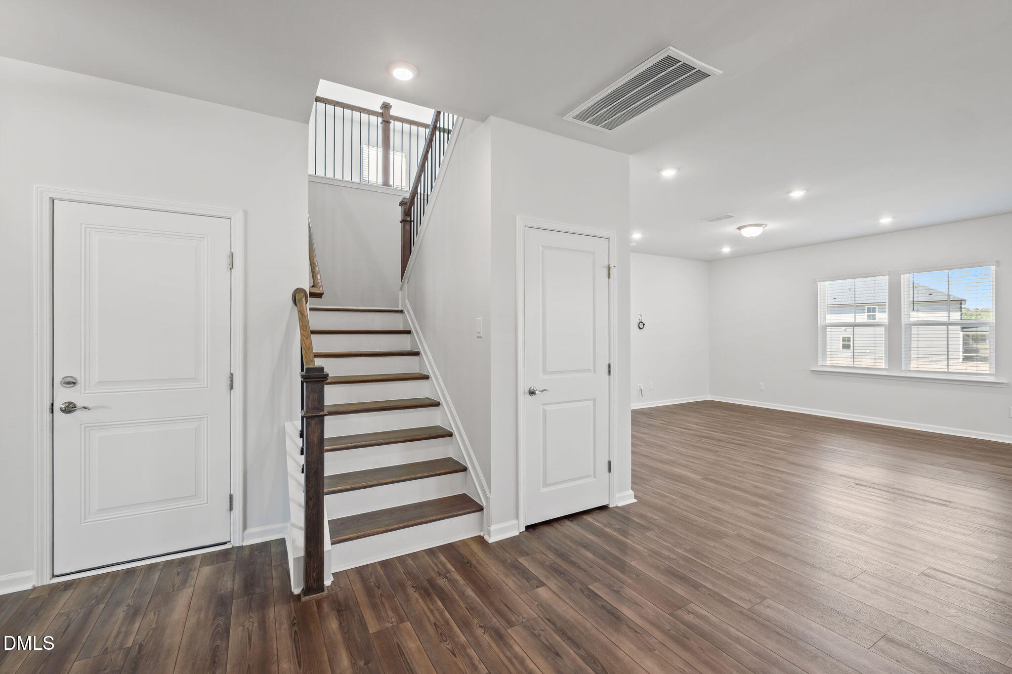 701 Mayfly Way Durham, NC 27703 - Photo 8 of 50 wooden floor in an empty room with a window
