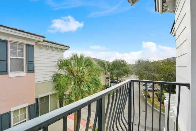 a view of a hallway with washer and dryer