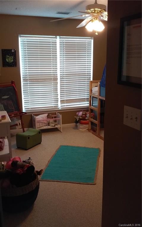 8445 Angwin Place Charlotte, NC 28262 - Photo 14 of 20 a view of a room with gym equipment