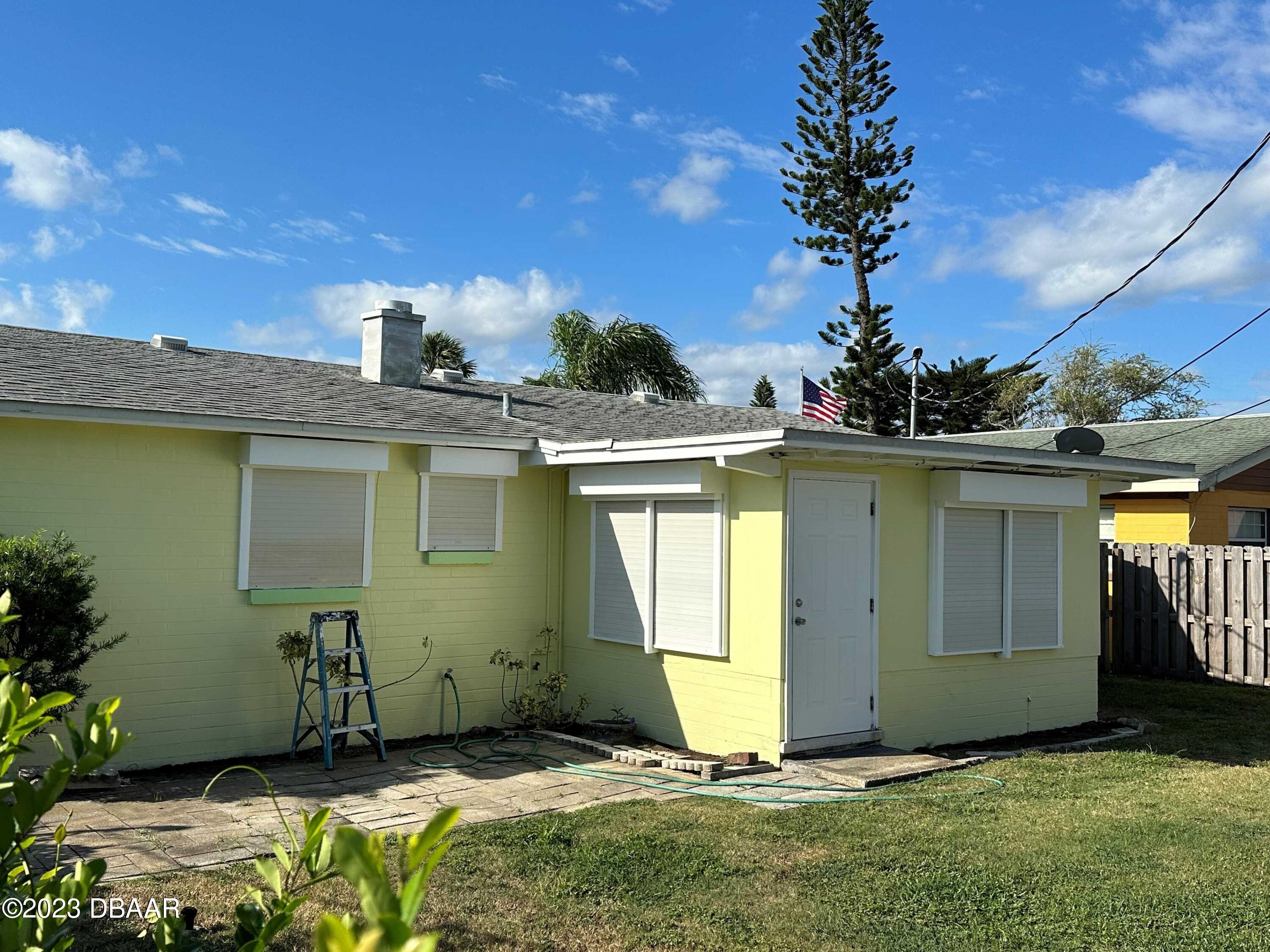 38 Carol Road Ormond Beach, FL 32176 - Photo 13 of 16 a view of a backyard with a garden