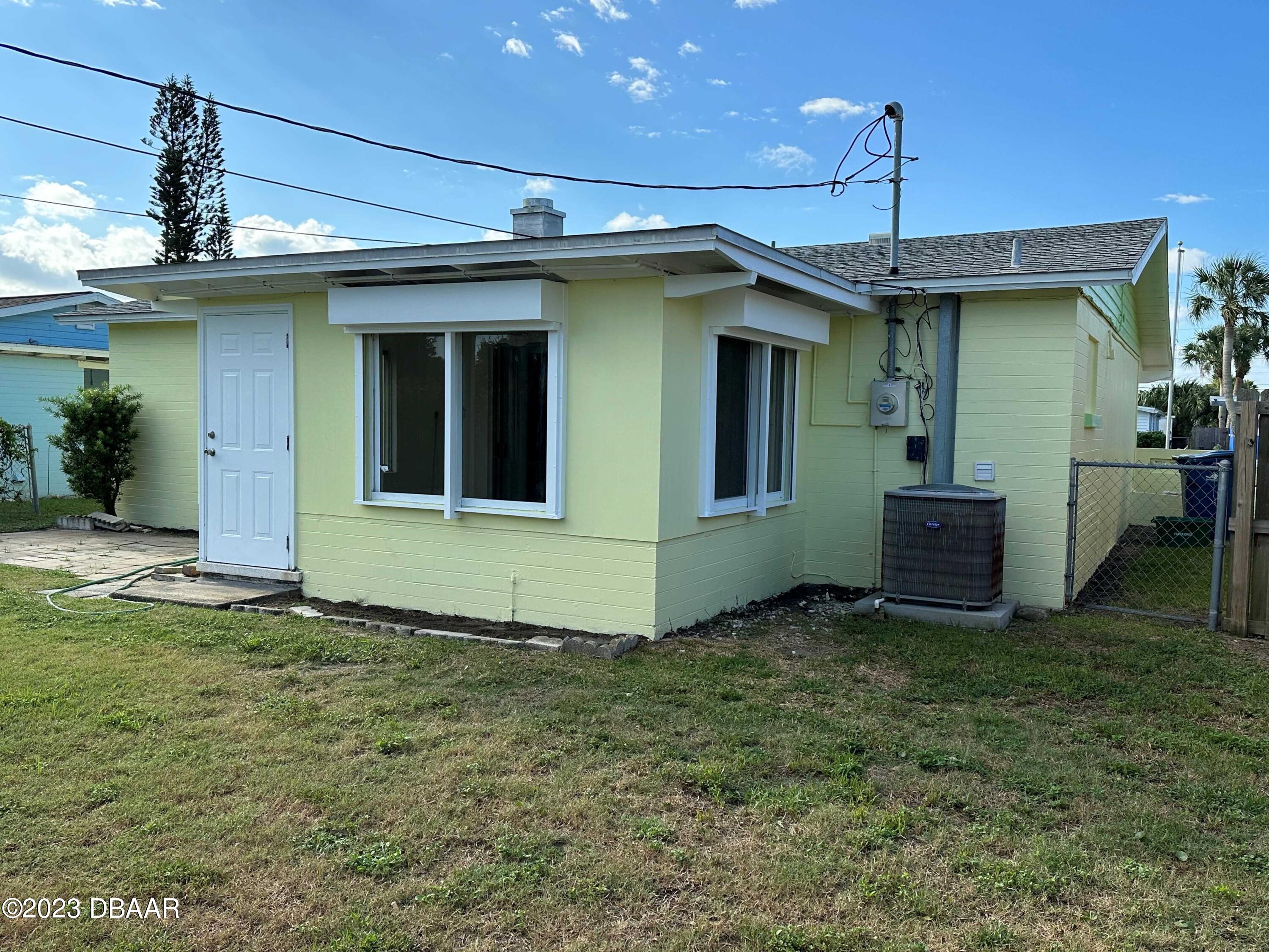 38 Carol Road Ormond Beach, FL 32176 - Photo 15 of 16 a front view of a house with a yard