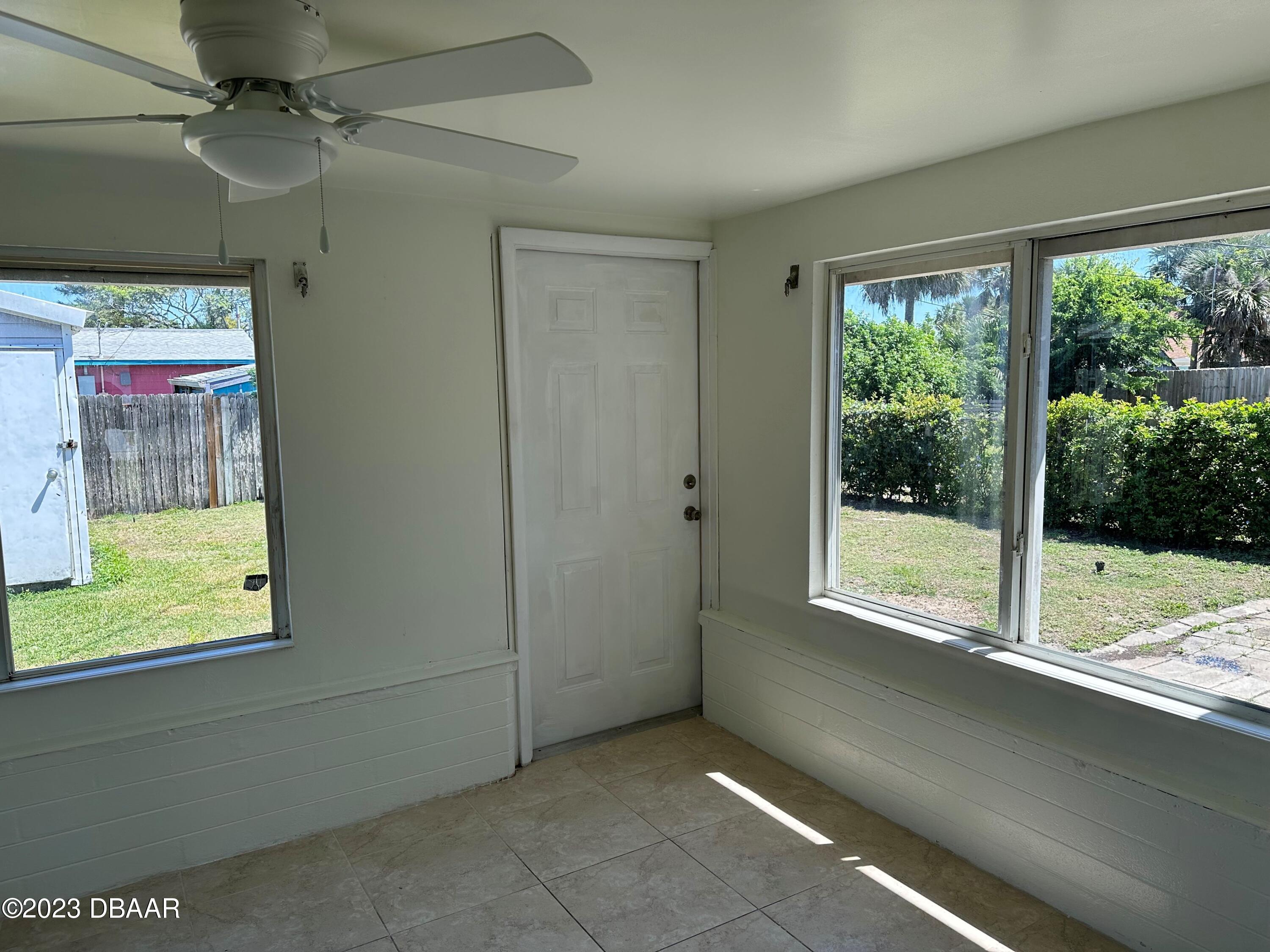 38 Carol Road Ormond Beach, FL 32176 - Photo 6 of 16 a view of empty room with window