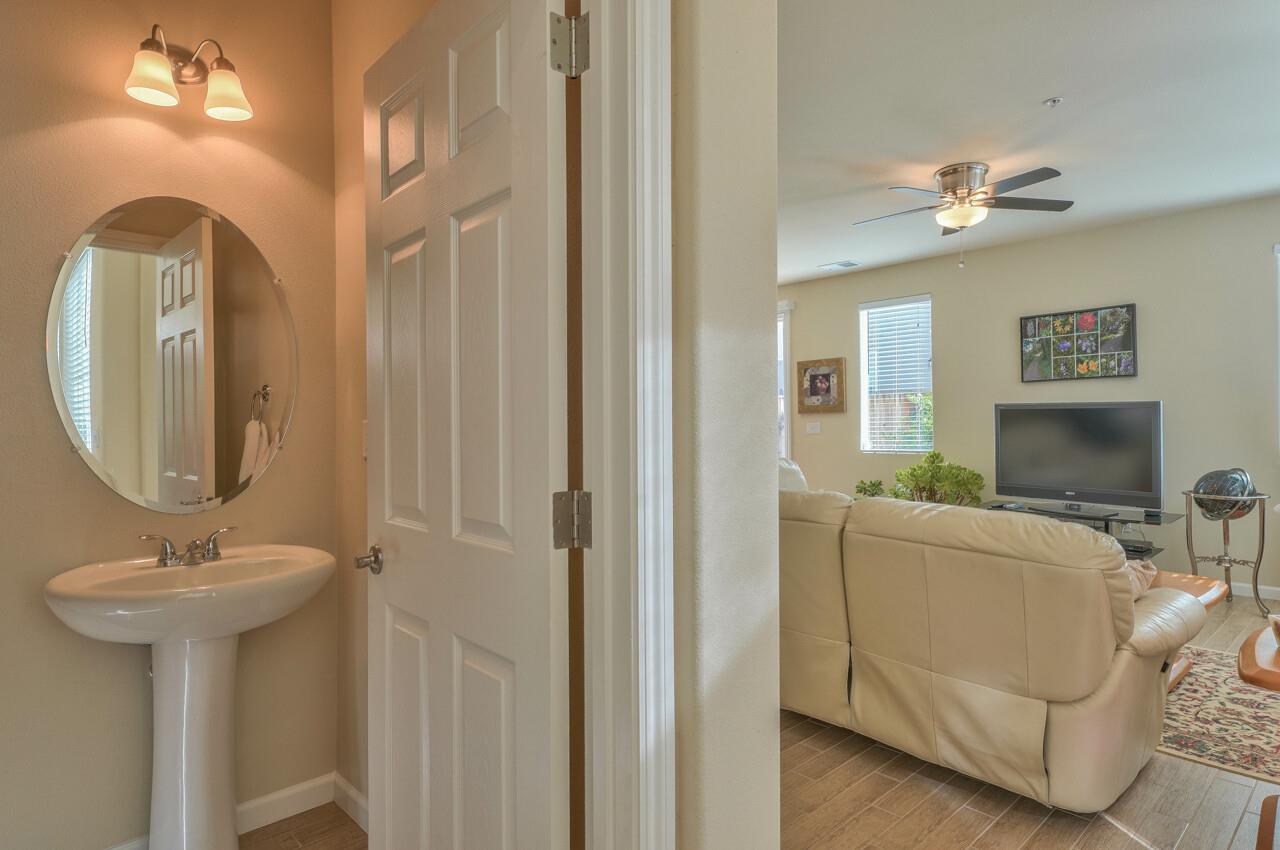 1805 Monte Bella Boulevard Salinas, CA 93905 - Photo 7 of 32 a en suite bathroom with a sink and a mirror