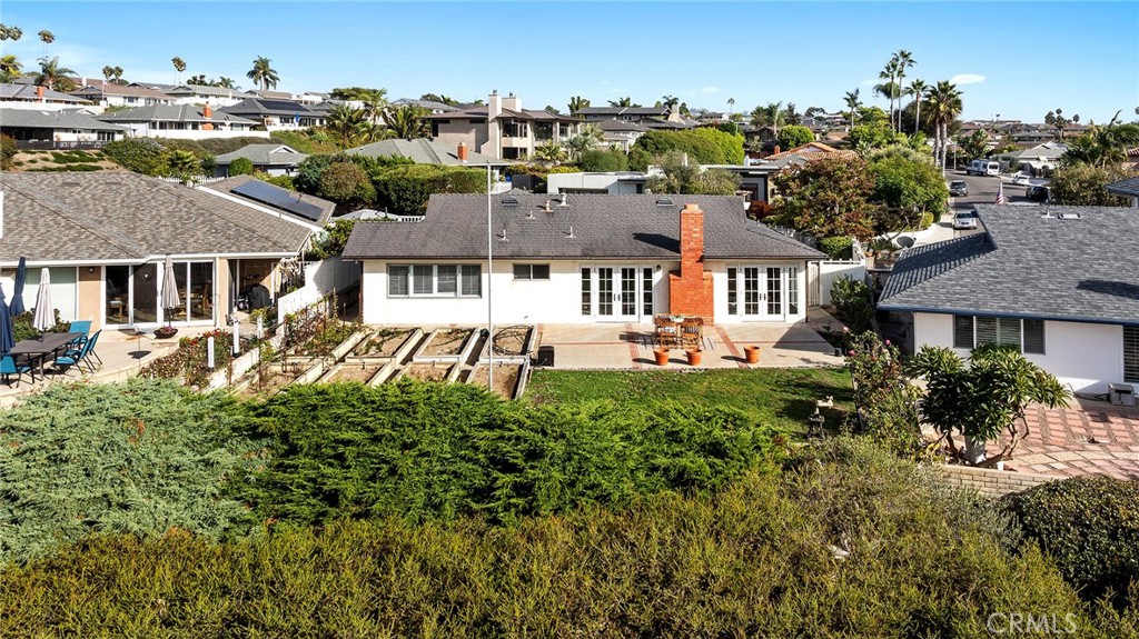 215 Via Montego San Clemente, CA 92672 - Photo 19 of 69 an aerial view of a house with a yard and potted plants