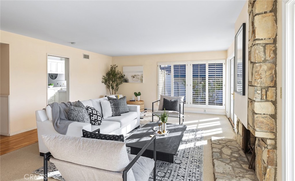 215 Via Montego San Clemente, CA 92672 - Photo 25 of 69 a living room with furniture and floor to ceiling windows