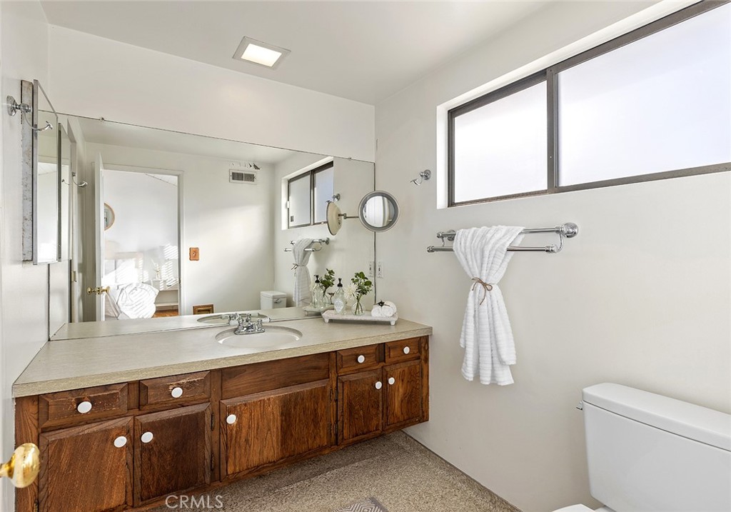 215 Via Montego San Clemente, CA 92672 - Photo 38 of 69 a spacious bathroom with a double vanity sink and a mirror