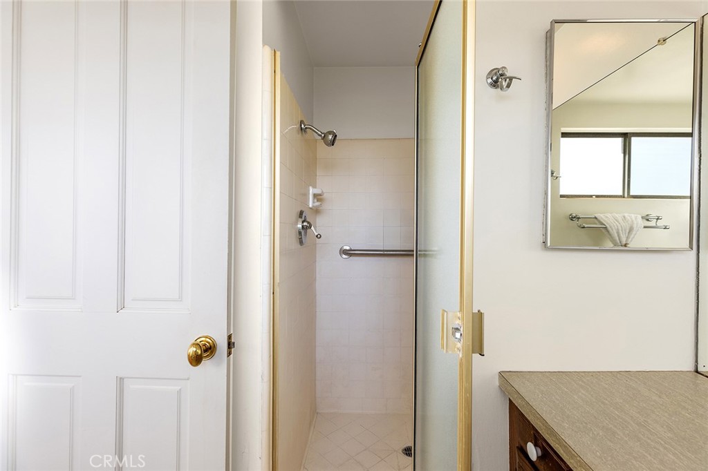 215 Via Montego San Clemente, CA 92672 - Photo 39 of 69 a bathroom with a granite countertop sink