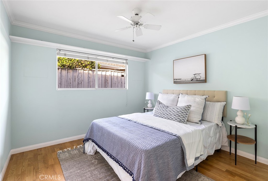 215 Via Montego San Clemente, CA 92672 - Photo 43 of 69 a bedroom with a bed and a painting on the wall