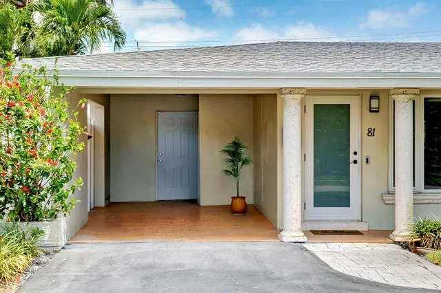 a view of outdoor space and front view of a house