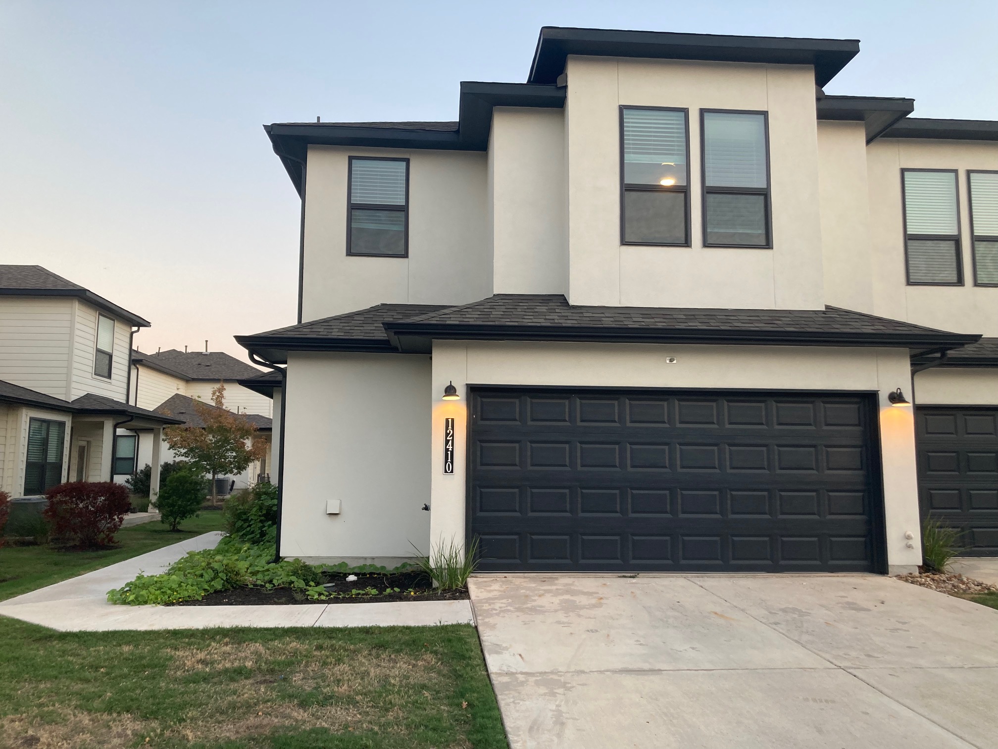 a house with yard in front of it