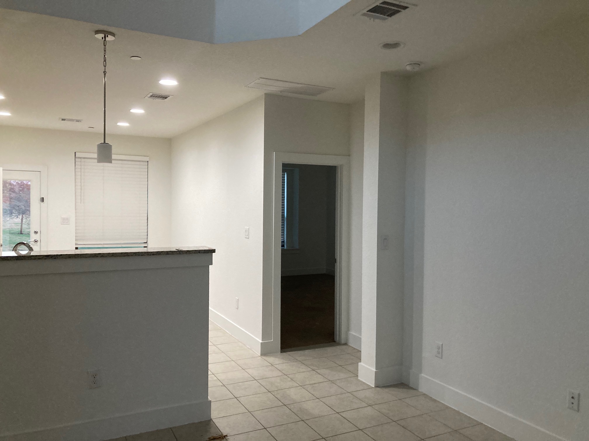 12410 Maypole Bend Austin, TX 78717 - Photo 15 of 32 a view of a kitchen with kitchen island