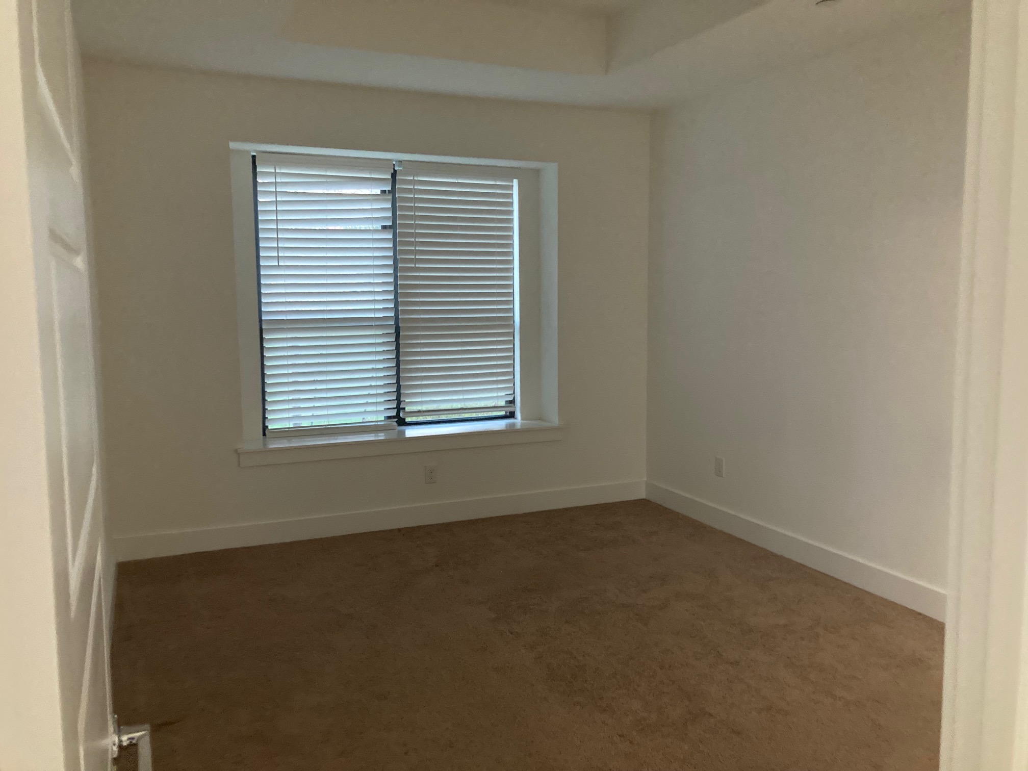 12410 Maypole Bend Austin, TX 78717 - Photo 18 of 32 an empty room with a window
