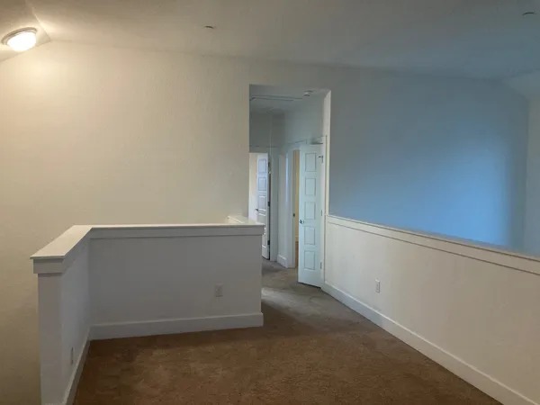 a view of hallway with stairs