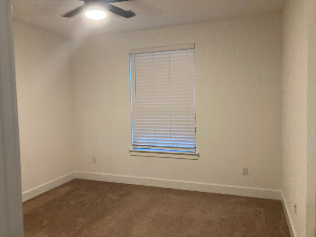 12410 Maypole Bend, Unit 1401 Austin, TX 78717 - Photo 22 of 32 an empty room with a window
