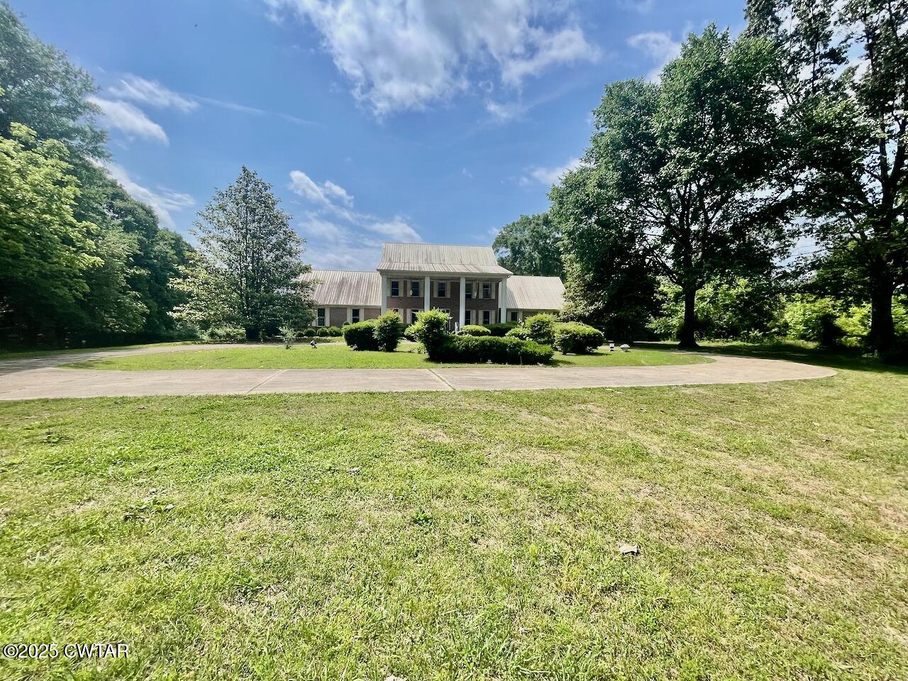 2688 Beech Bluff Road Jackson, TN 38301 - Photo 2 of 30 a view of a house with a big yard