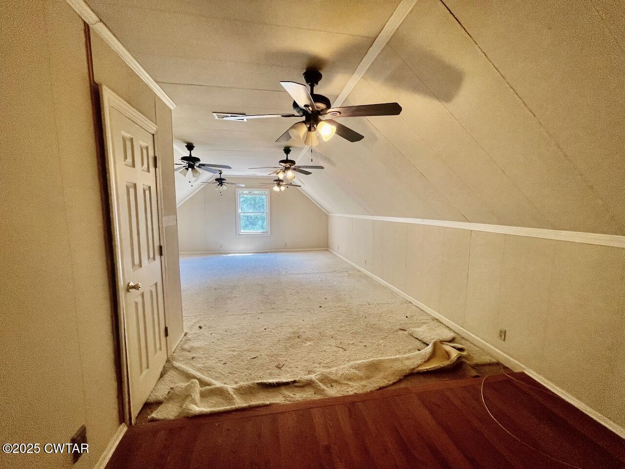 2688 Beech Bluff Road Jackson, TN 38301 - Photo 21 of 30 view of a room with wooden floor and a ceiling fan