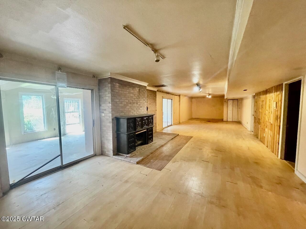 2688 Beech Bluff Road Jackson, TN 38301 - Photo 27 of 30 a view of a livingroom with a fireplace