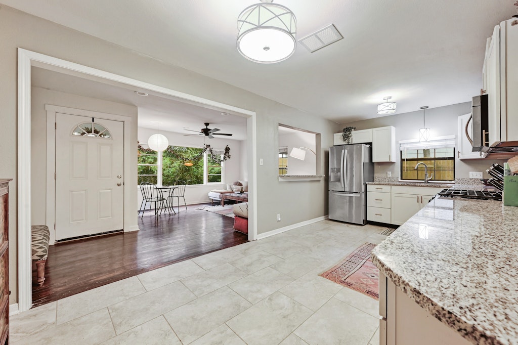 4025 Valley View Road, Unit 2 Austin, TX 78704 - Photo 7 of 19 a view of a kitchen and dining room