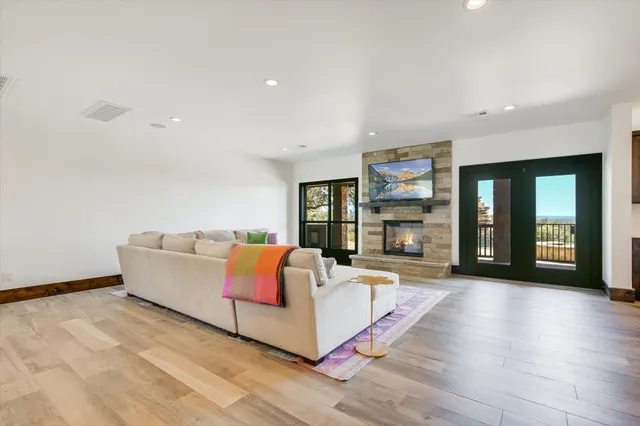 a living room with furniture and window