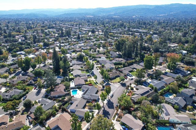 an aerial view of a city with lots of residential buildings