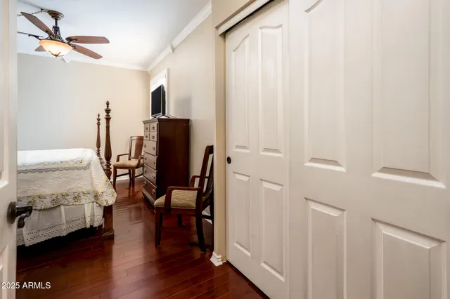 a view of a workspace with wooden floor