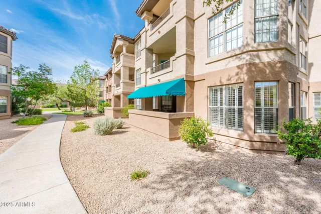 a view of a building with a street