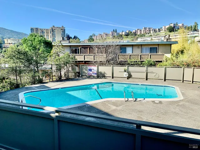 a view of a house with a swimming pool