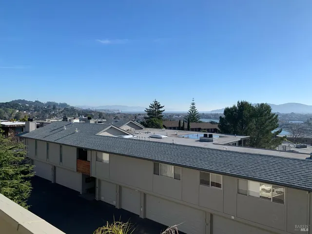 a view of a city from a balcony