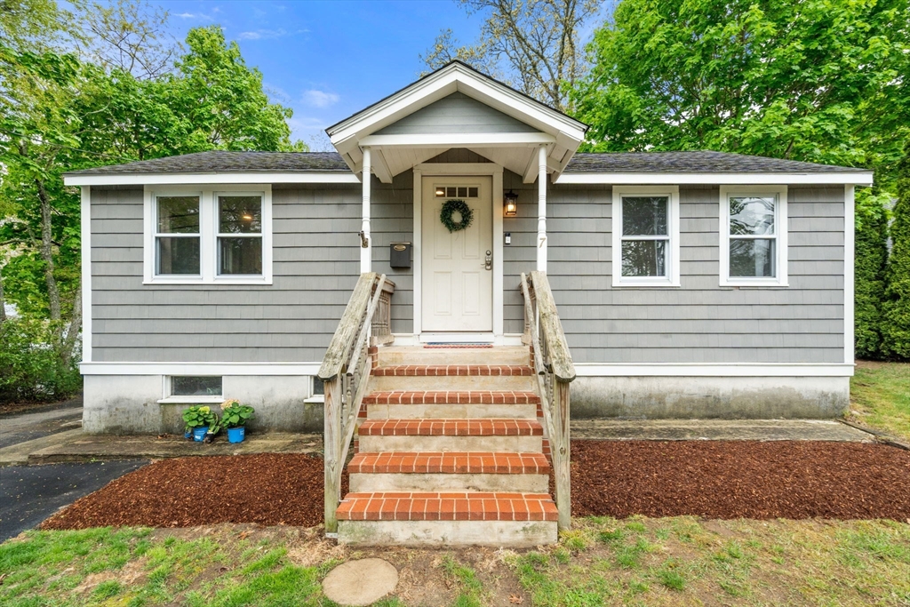 a view of outdoor space yard and front view of a house