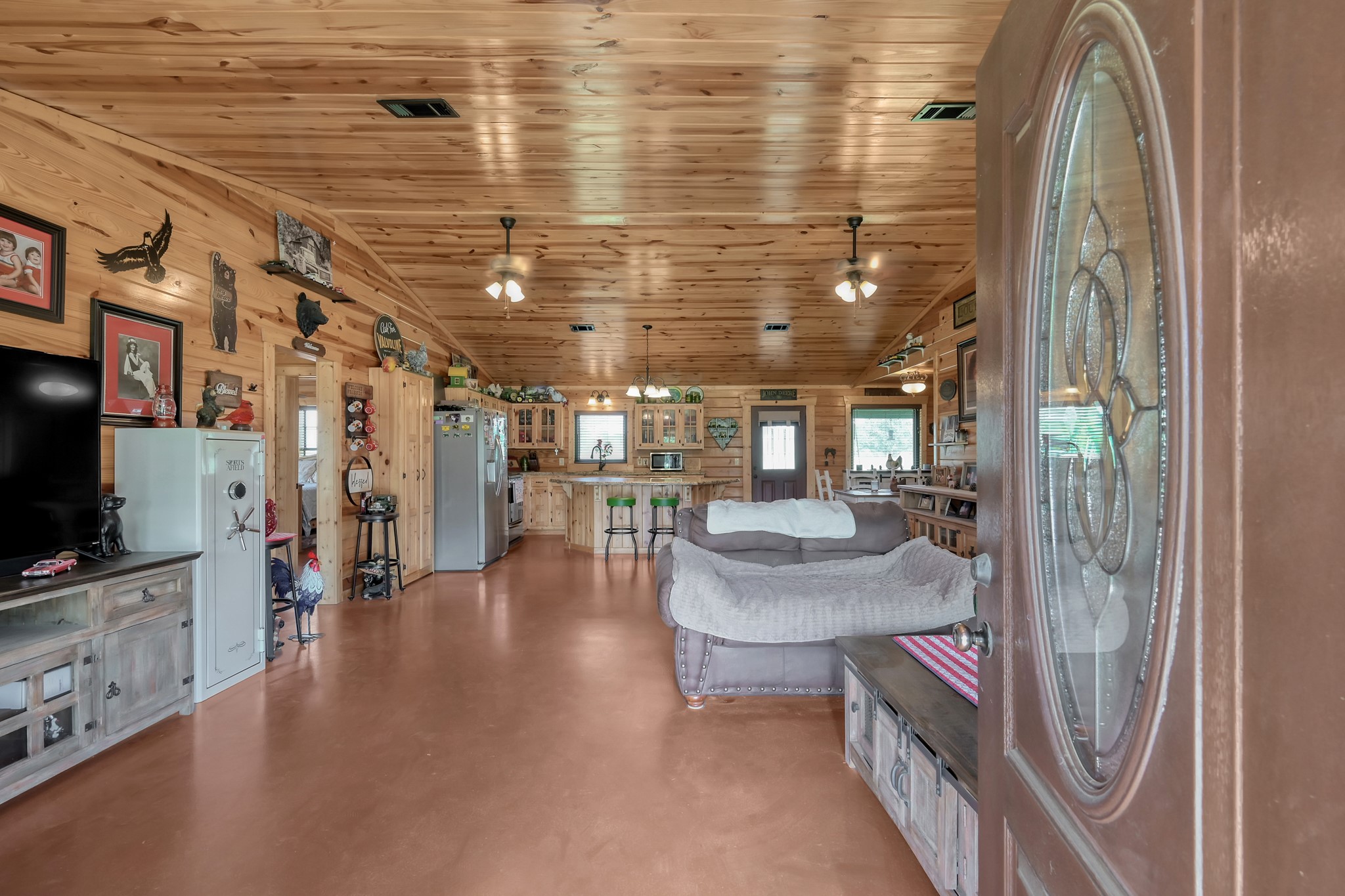 130 Raleigh Circle Trinity, TX 75862 - Photo 4 of 19 a view of a livingroom with furniture and a flat screen tv