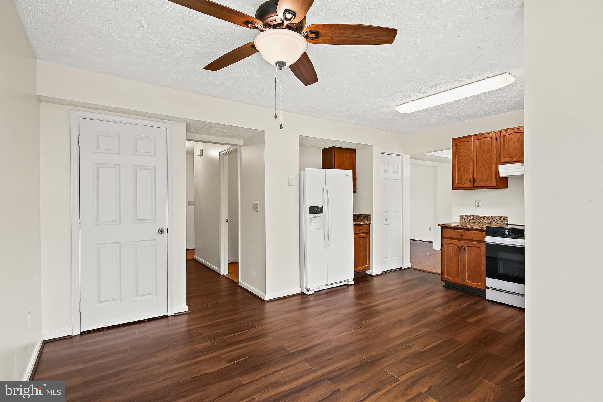 3 Greenknoll Boulevard Hanover, MD 21076 - Photo 16 of 34 a view of a workspace with wooden floor and ceiling fan