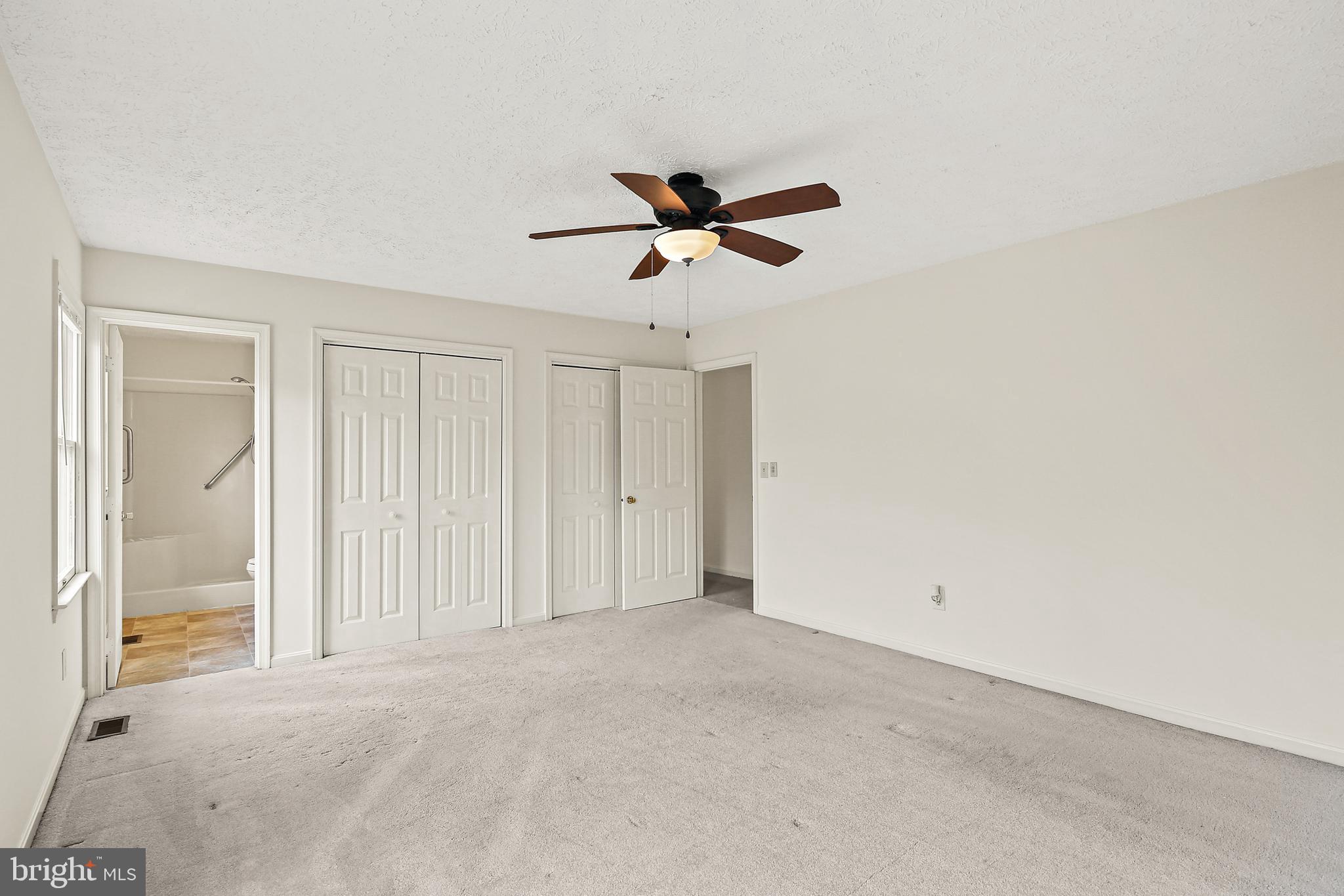 3 Greenknoll Boulevard Hanover, MD 21076 - Photo 20 of 34 a view of a livingroom with a ceiling fan and window