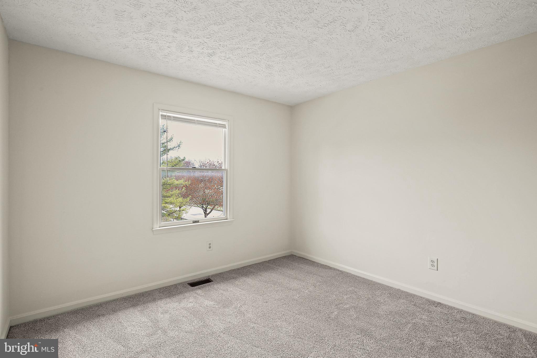 3 Greenknoll Boulevard Hanover, MD 21076 - Photo 23 of 34 an empty room with a window