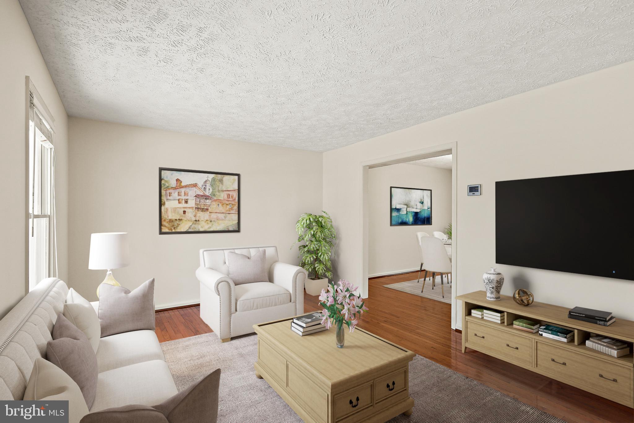 3 Greenknoll Boulevard Hanover, MD 21076 - Photo 3 of 34 a living room with furniture and a flat screen tv