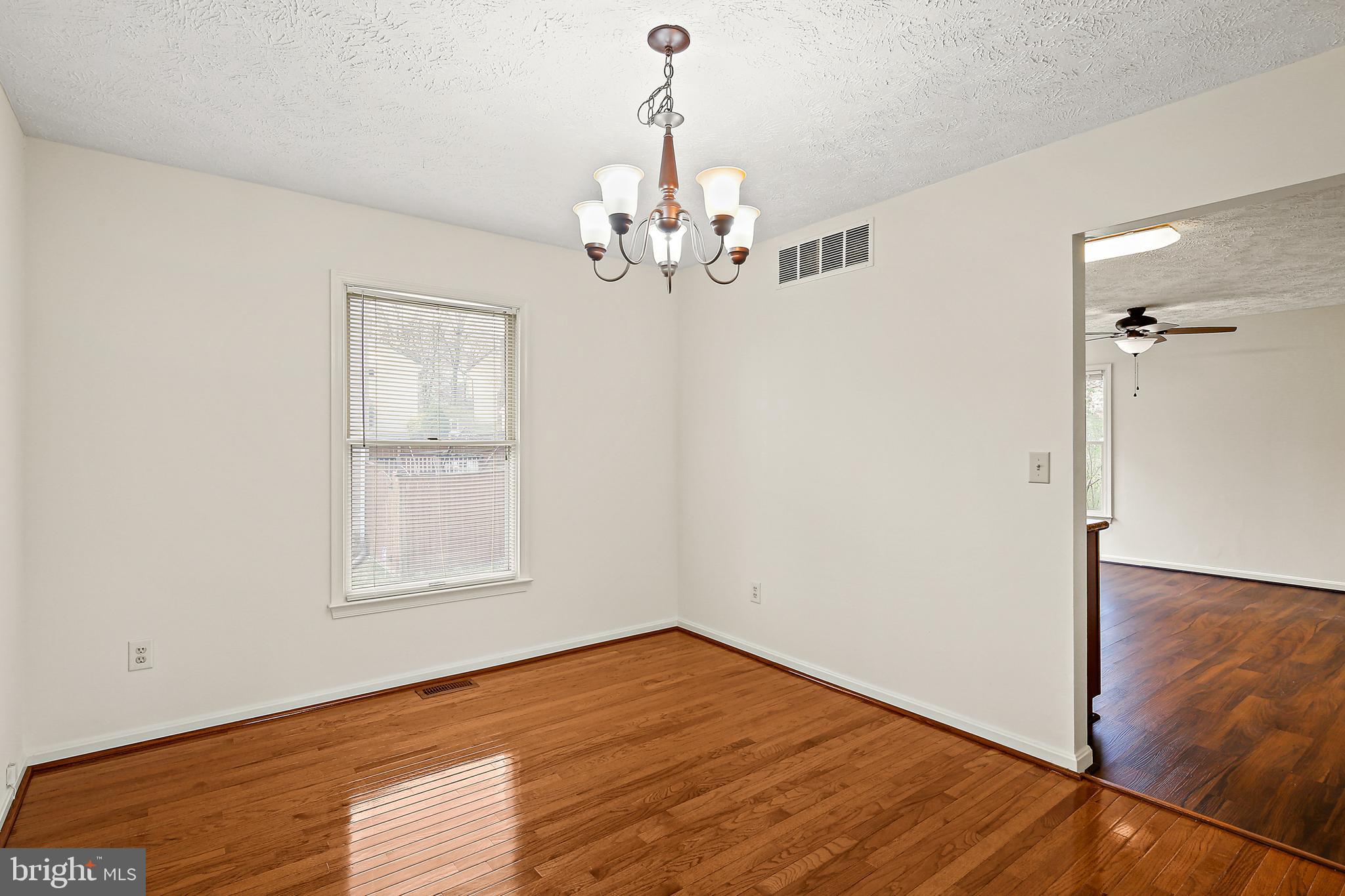 3 Greenknoll Boulevard Hanover, MD 21076 - Photo 8 of 34 a view of an empty room with a window