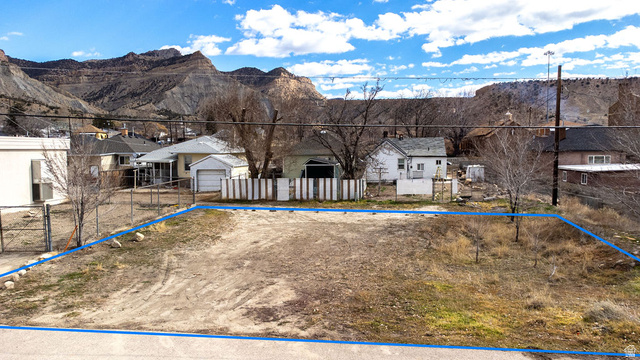 10 South 100 West Helper, UT 84526 - Photo 3 of 11 View of swimming pool with a mountain view and a residential view