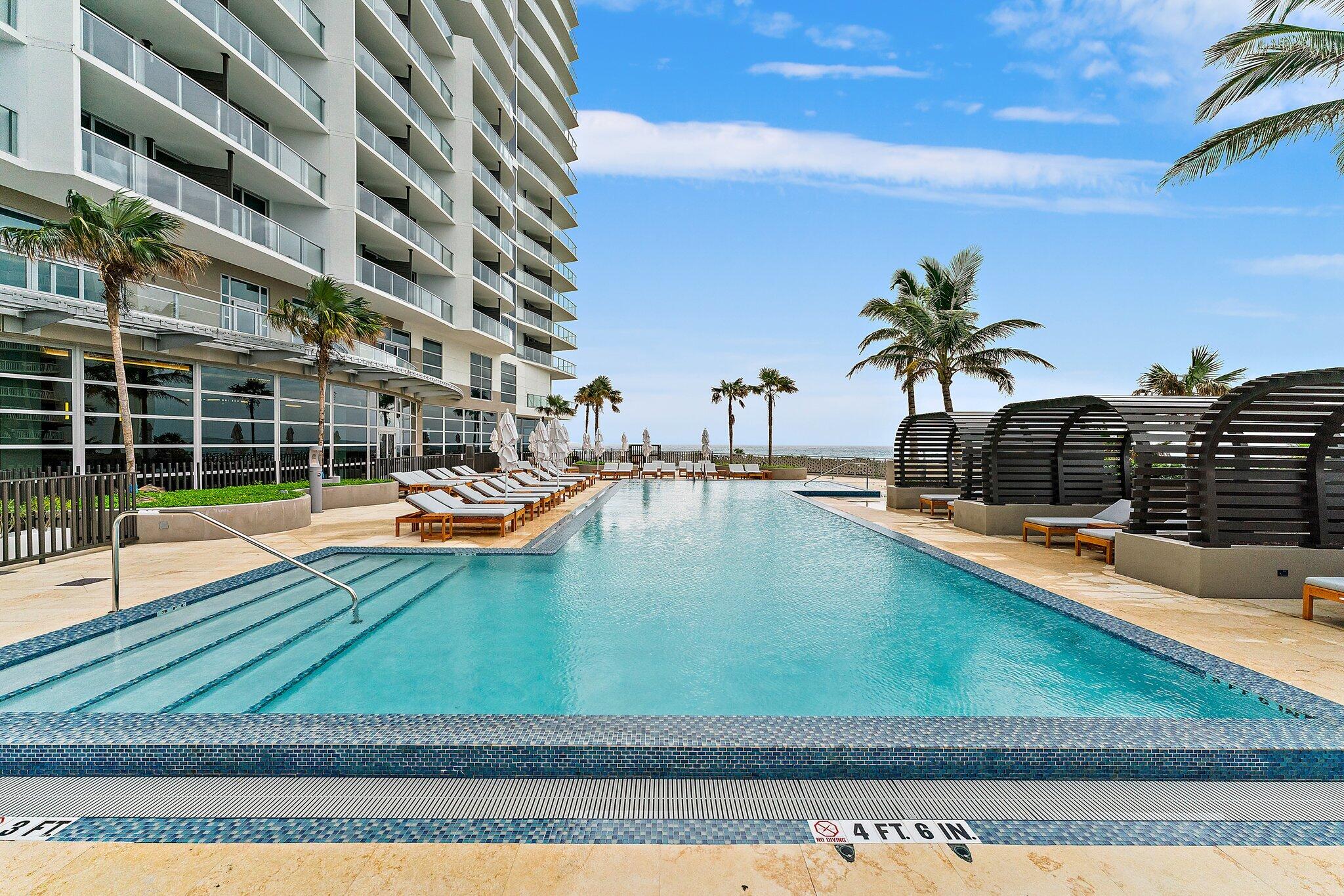 3100 North Ocean Drive, Unit H1206 Singer Island, FL 33404 - Photo 51 of 78 a view of swimming pool with outdoor seating