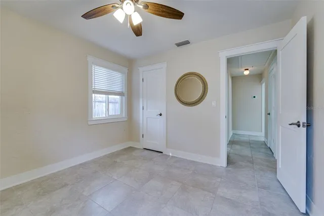 an empty room with windows