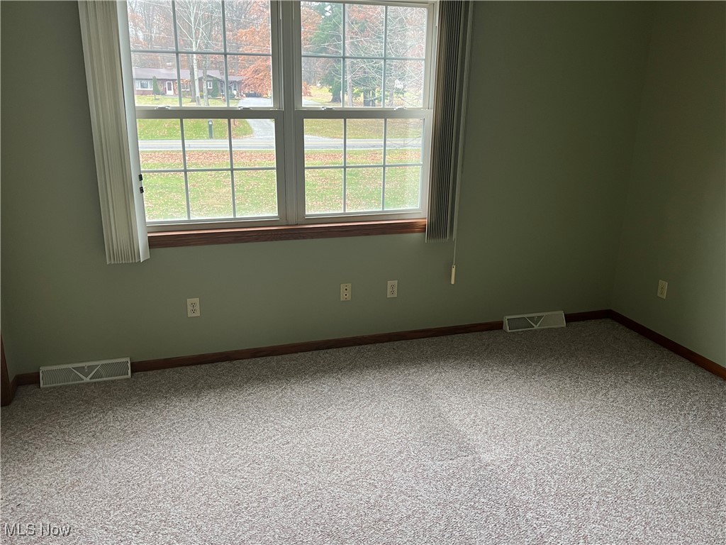 11525 Rapp Road New Middletown, OH 44442 - Photo 25 of 32 Unfurnished room with carpet