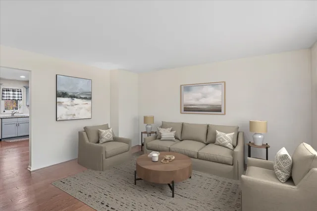 a kitchen with granite countertop kitchen island a table and chairs in it