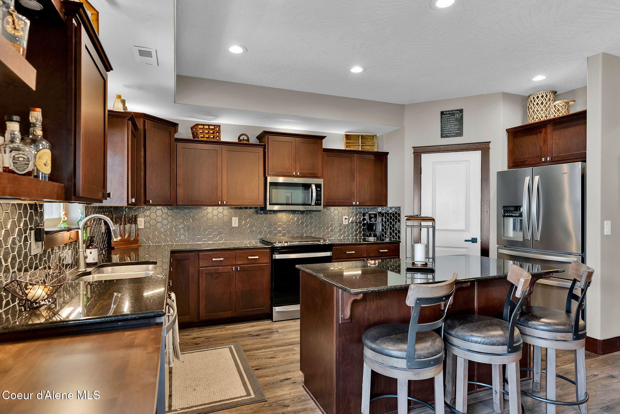 3343 West Apricot Road Coeur D'Alene, ID 83815 - Photo 11 of 48 Island barstools and kitchen
