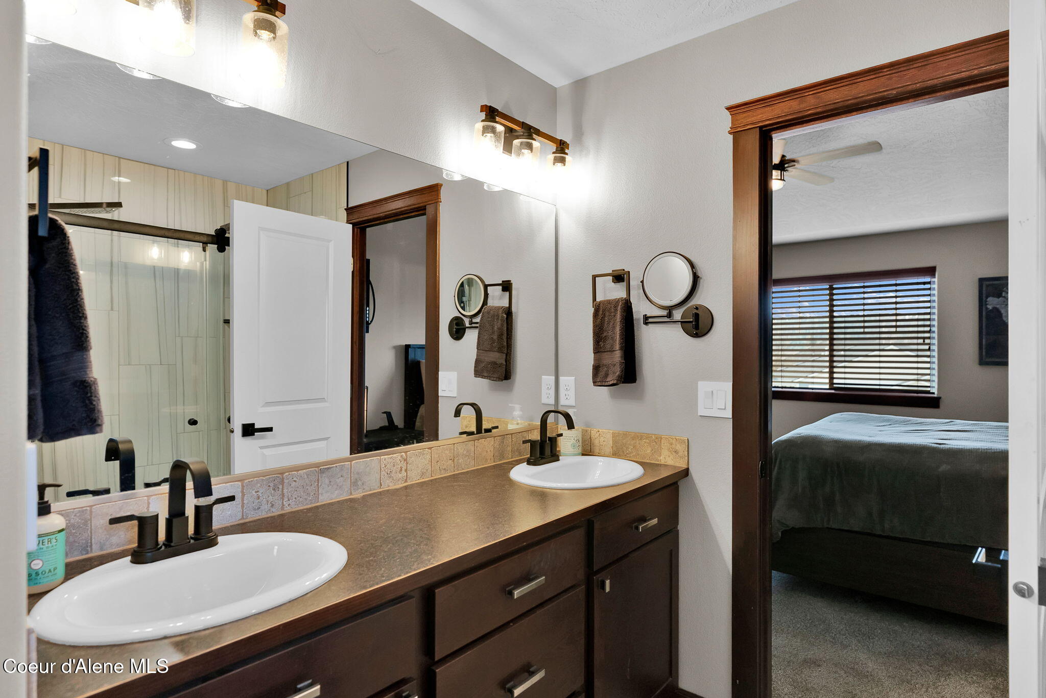 3343 West Apricot Road Coeur D'Alene, ID 83815 - Photo 24 of 48 Master bath sinks doorway
