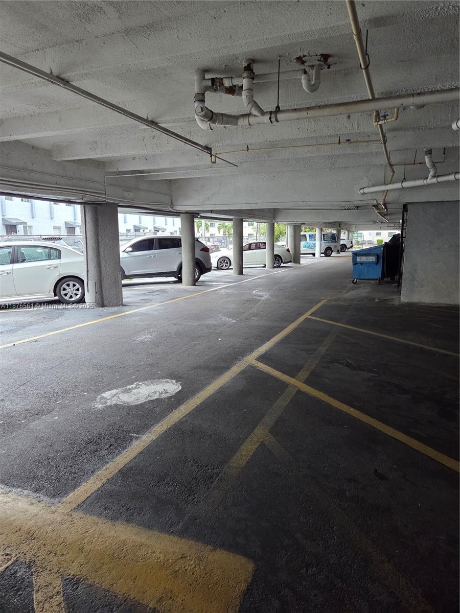 1035 West 77th Street, Unit 305 Hialeah, FL 33014 - Photo 13 of 16 a view of parking garage