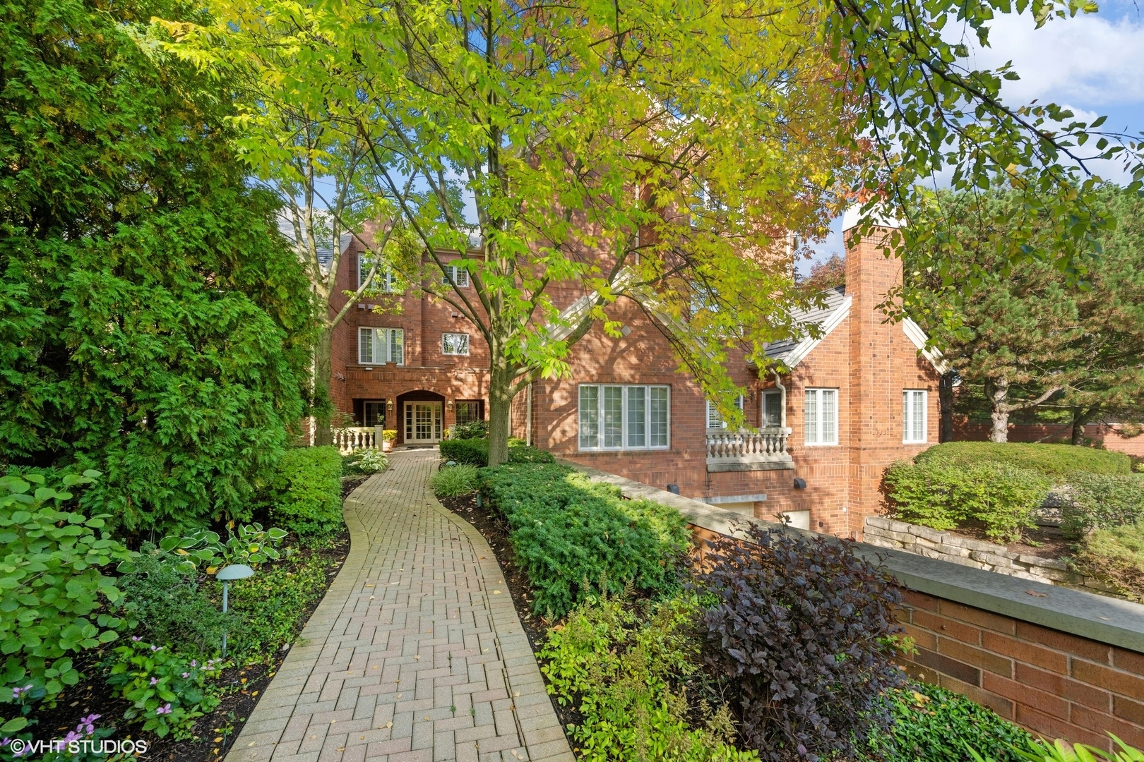 223 Regent Wood Road Northfield, IL 60093 - Photo 1 of 21 front view of a house with a yard