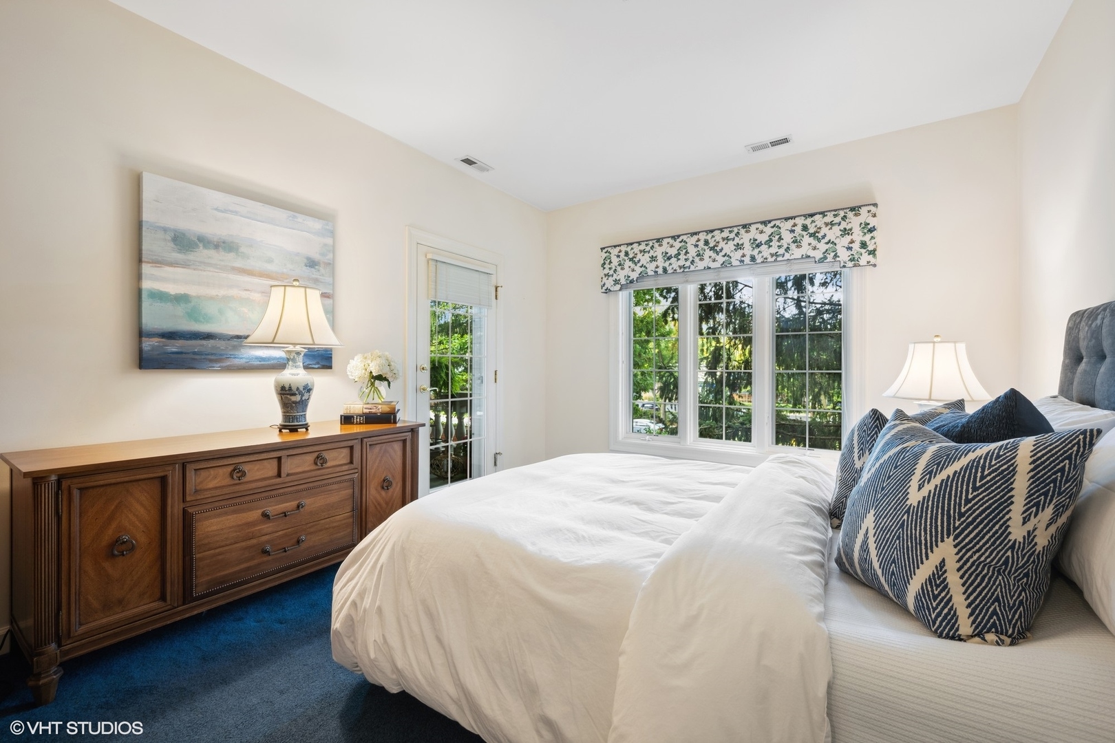 223 Regent Wood Road Northfield, IL 60093 - Photo 17 of 21 a spacious bedroom with a bed and a large window