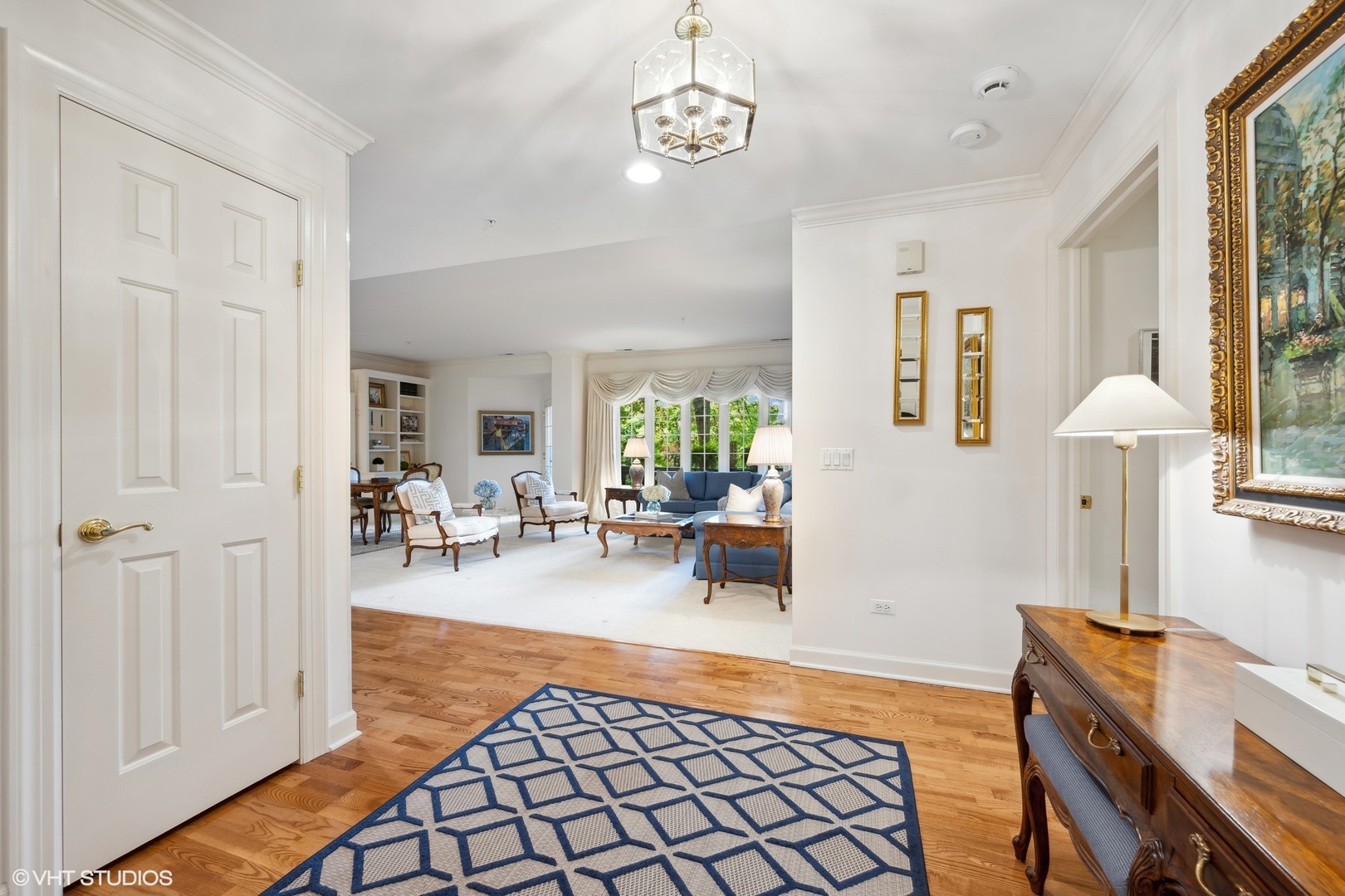 223 Regent Wood Road Northfield, IL 60093 - Photo 4 of 21 a living room with furniture and a table